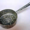 Steelpan gemaakt van de deksel van een munitie container ,,Schwerter zu Pflugescharen,,