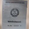 NVA blanco Wehrdienstausweis met mapje en herkenningsplaatje