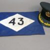 Nederlandse KL hoofd officiers pet met stafauto vlag 43e Painfbat?