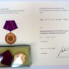 Oorkonde met medaille Zivil Verteidigung im Bronze 1983