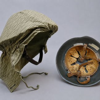 DDR NVA M56 Helm – 1e Model 1960 met periodieke helmcover