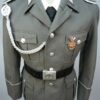 DDR / NVA jasje, oud wollen model met leren koppel, ,,Schutzenschnur,, en medaille