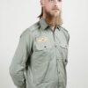 Groene blouse met embleem, nieuw