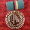 DDR LPG medaille voor ,,ausgezeichnete leistungen,, in brons - Afbeelding 2