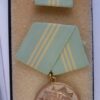 Medaille met spangen fur Treu Dienst in goud, Volkspolizei